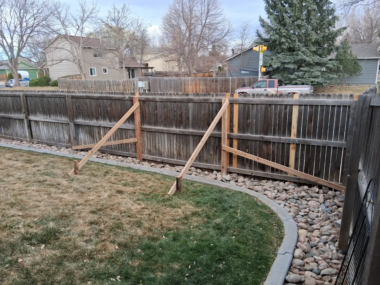 Fence repair and rebuilt sections